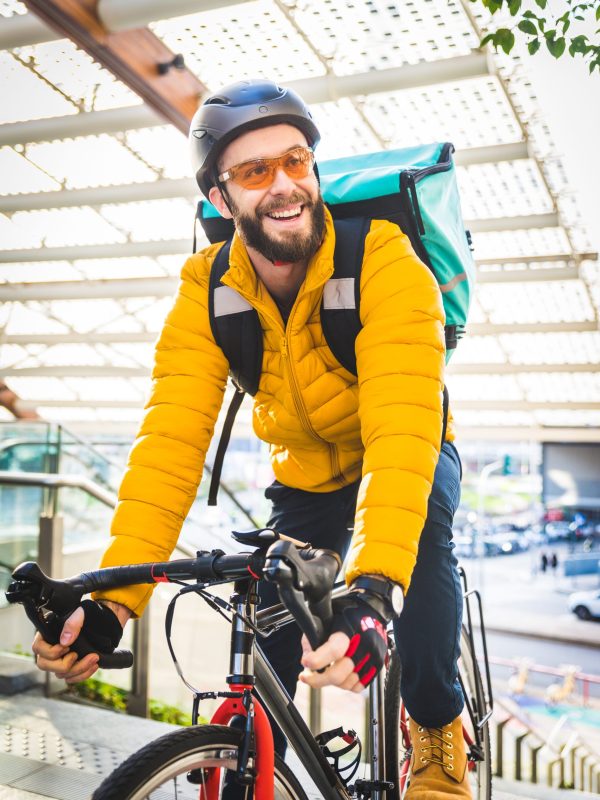 Food delivery service, rider delivering food to clints with bicycle - Concepts about transportation, food delivery and technology